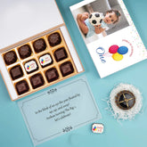 Sample of first birthday invitation card online with 12 chocolates